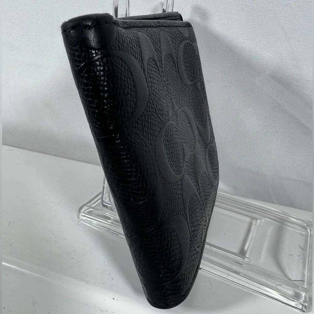 2100: Coach Black Signature Embossed Leather Bifold Wallet Men’s